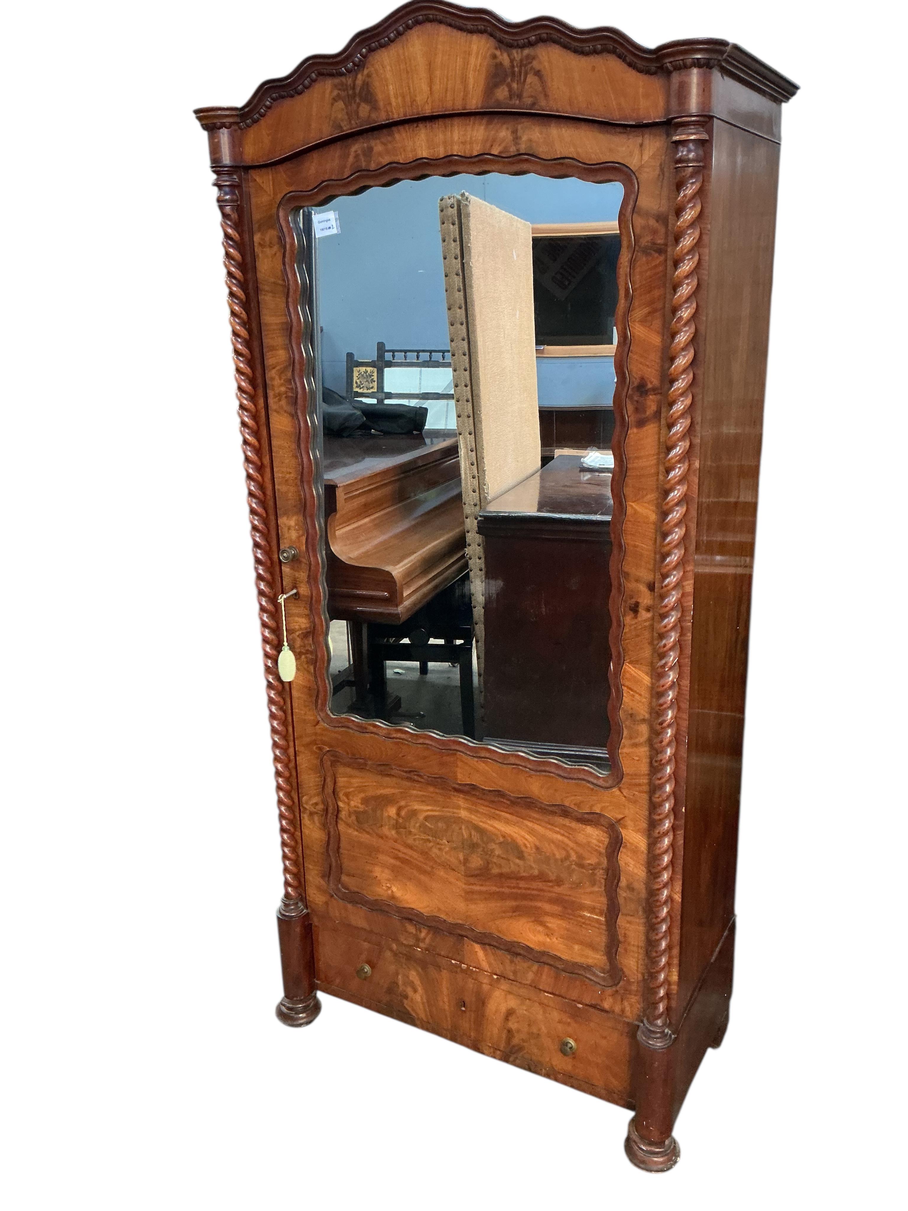 A small 19th century French figured mahogany mirrored armoire, width 80cm, depth 40cm, height 176cm